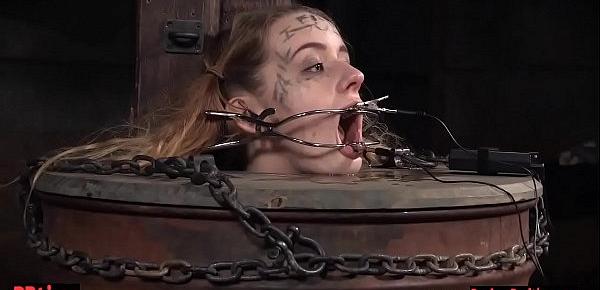  Bdsm babe trapped in a barrel and electrified